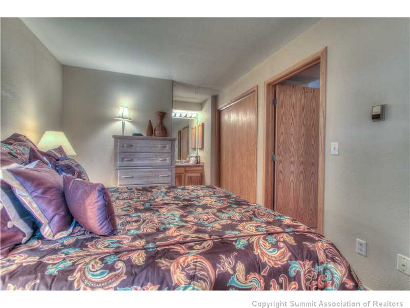 95611 Ryan Gulch Road, Unit 615 Silverthorne, CO 80498 - Photo 6 of 21 Master Bedroom.