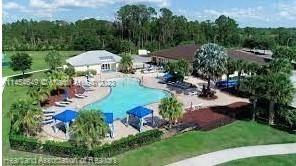 6868 Pinta Drive Sebring, FL 33872 - Photo 2 of 14 an aerial view of a house with garden space and street view