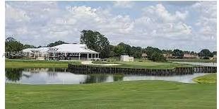 6868 Pinta Drive Sebring, FL 33872 - Photo 6 of 14 a view of a lake with houses with outdoor space