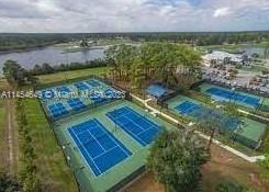 6868 Pinta Drive Sebring, FL 33872 - Photo 9 of 14 a view of a lake with a outdoor space