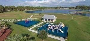 6868 Pinta Drive Sebring, FL 33872 - Photo 10 of 14 a view of a lake with a mountain in the background