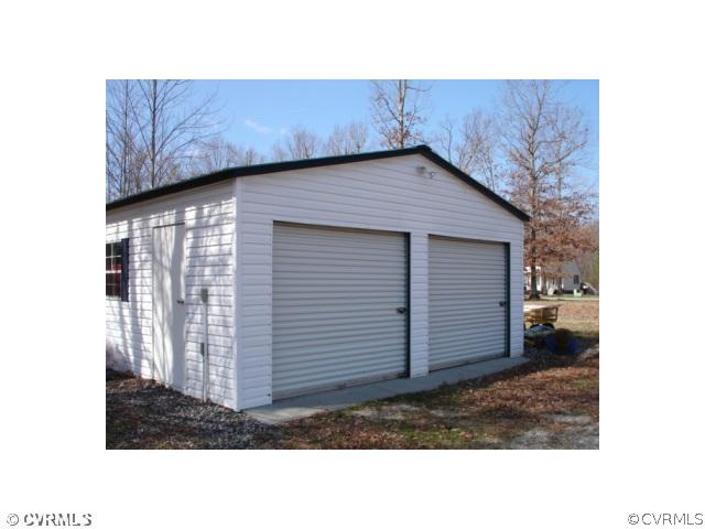 11501 Corte Castle Road Chesterfield, VA 23838 - Photo 3 of 12 a black and white building with a outdoor space