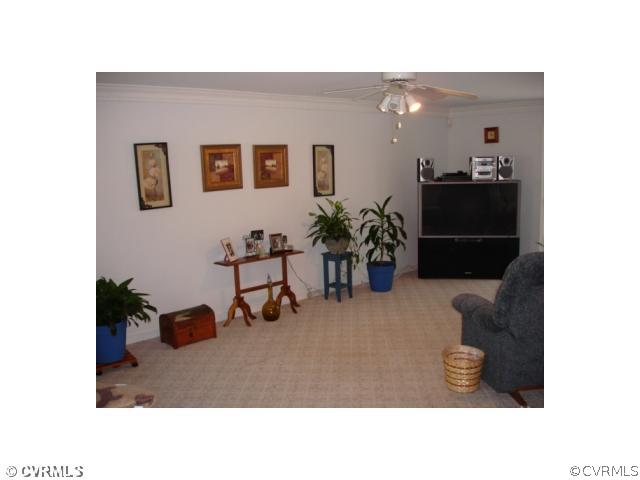 11501 Corte Castle Road Chesterfield, VA 23838 - Photo 6 of 12 a room with furniture and gym equipment