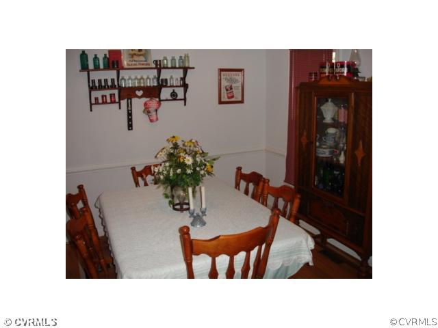 11501 Corte Castle Road Chesterfield, VA 23838 - Photo 7 of 12 a living room with furniture and wooden floor