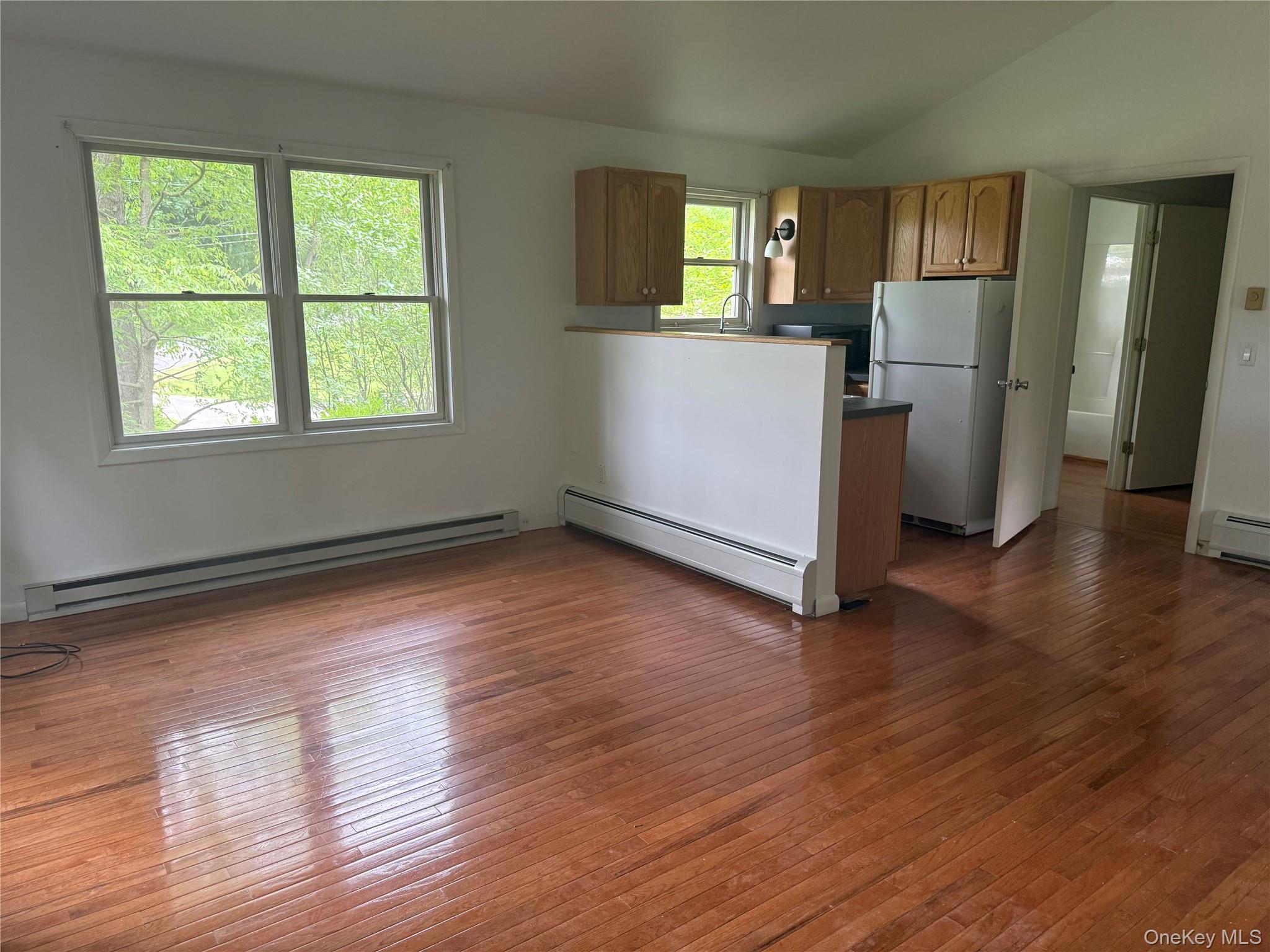 183 Barrytown Road Barrytown, NY 12507 - Photo 22 of 41 an empty room with wooden floor and windows