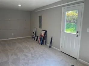 a view of room with furniture and a window