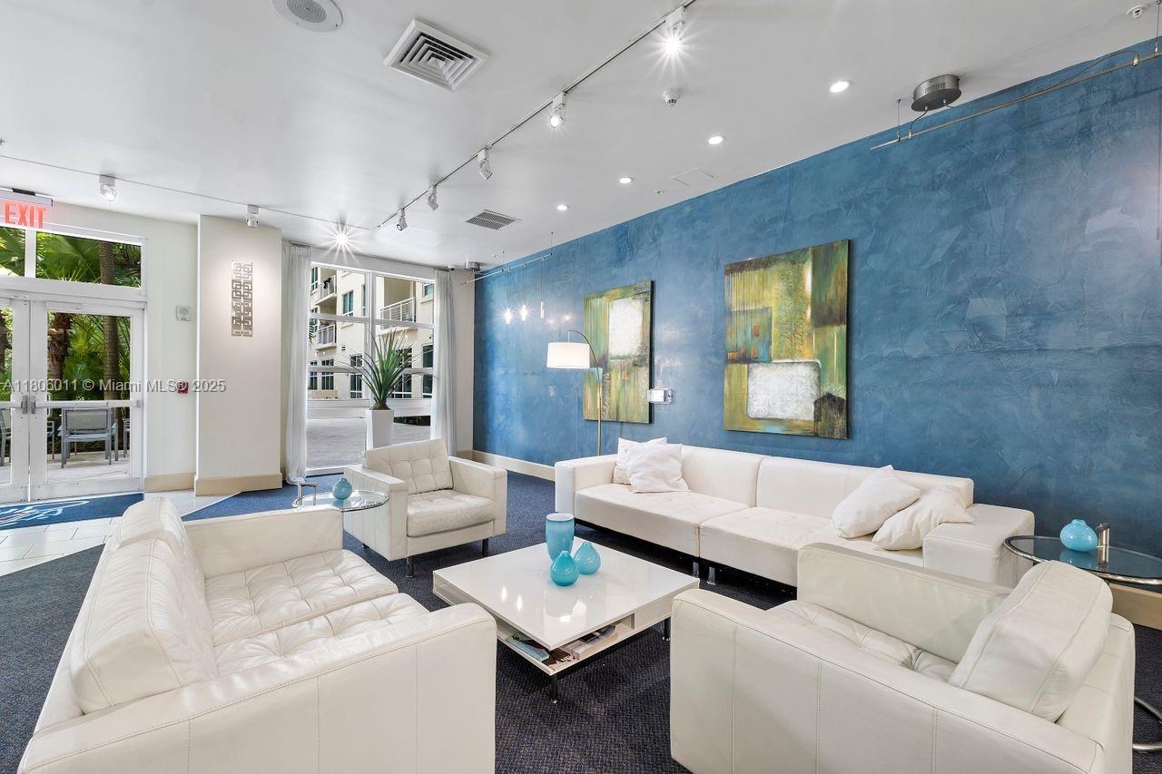 2001 Biscayne Boulevard, Unit 2308 Miami, FL 33137 - Photo 25 of 29 a living room with furniture and a large window