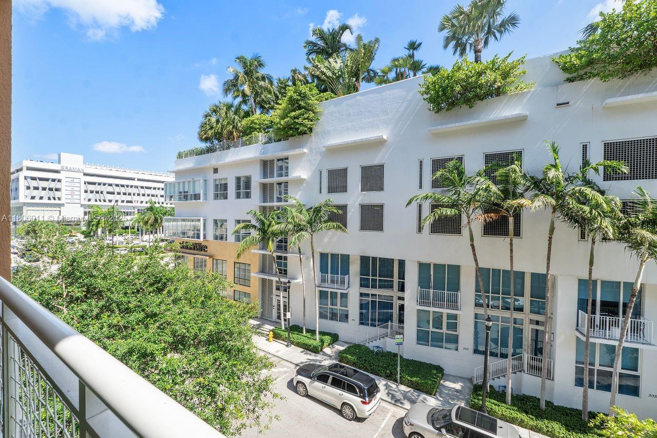 2001 Biscayne Boulevard, Unit 2308 Miami, FL 33137 - Photo 5 of 29 a view of a house with balcony and garden