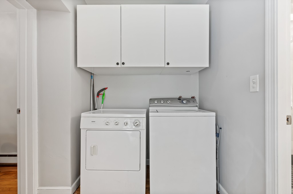 8 Dwight Street, Unit 1 Boston, MA 02118 - Photo 14 of 20 a utility room with dryer and washer