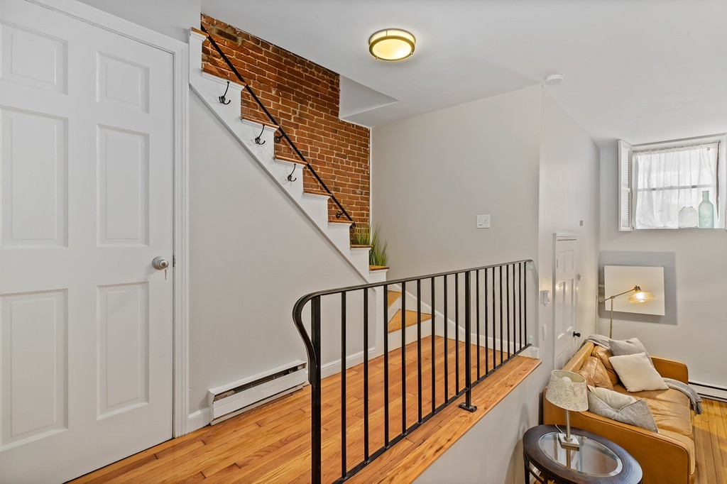 8 Dwight Street, Unit 1 Boston, MA 02118 - Photo 6 of 20 a bedroom with bed and a window