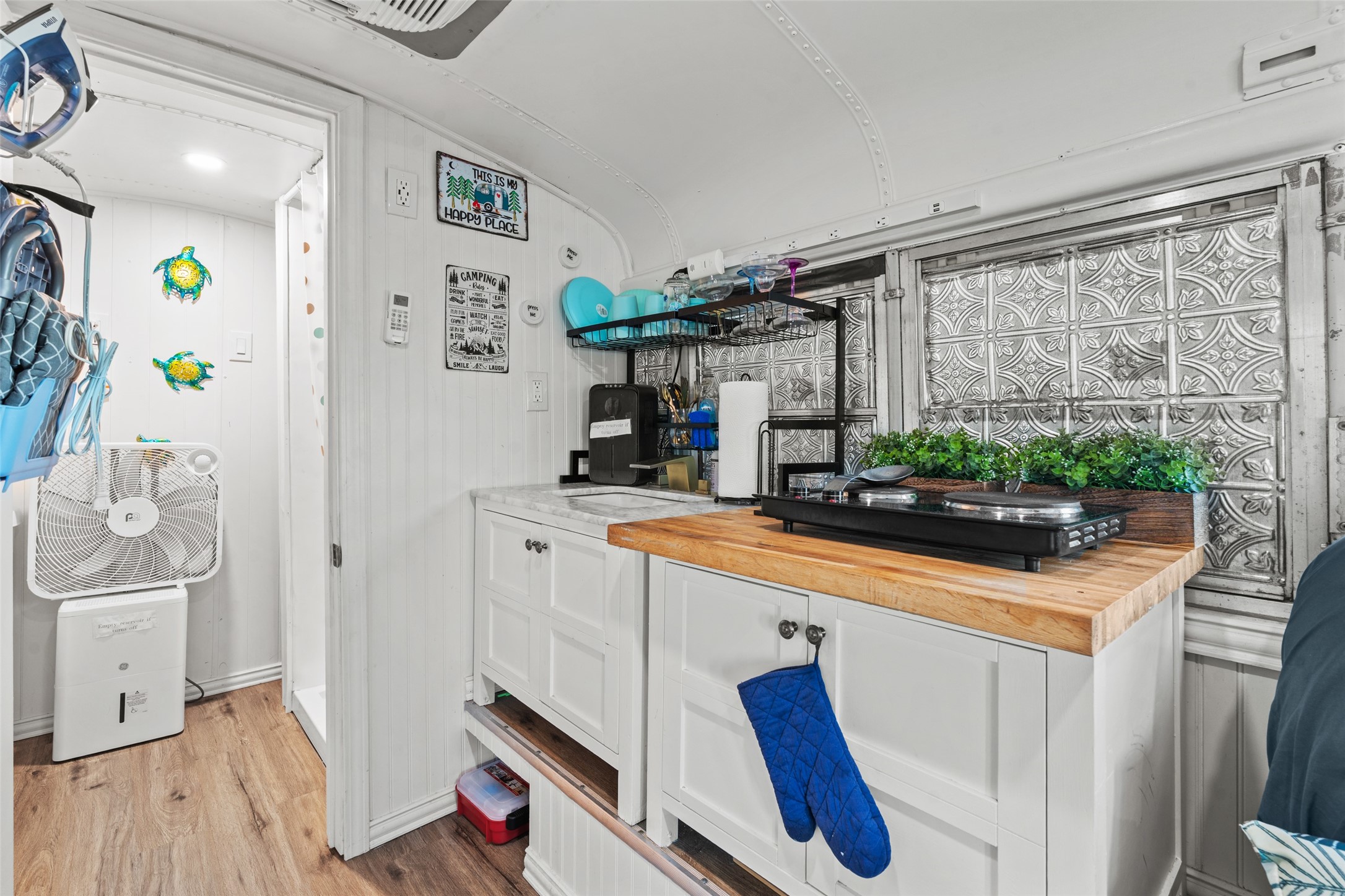 1287 North Crystal Beach Road Crystal Beach, TX 77650 - Photo 13 of 45 a kitchen with stainless steel appliances a sink and a refrigerator