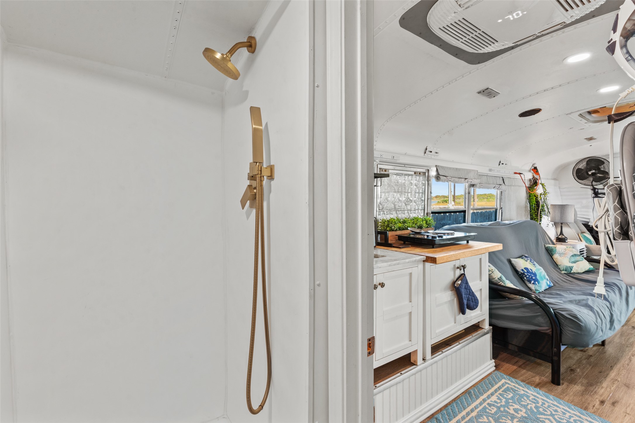 1287 North Crystal Beach Road Crystal Beach, TX 77650 - Photo 16 of 45 a view of a hallway and a livingroom with furniture