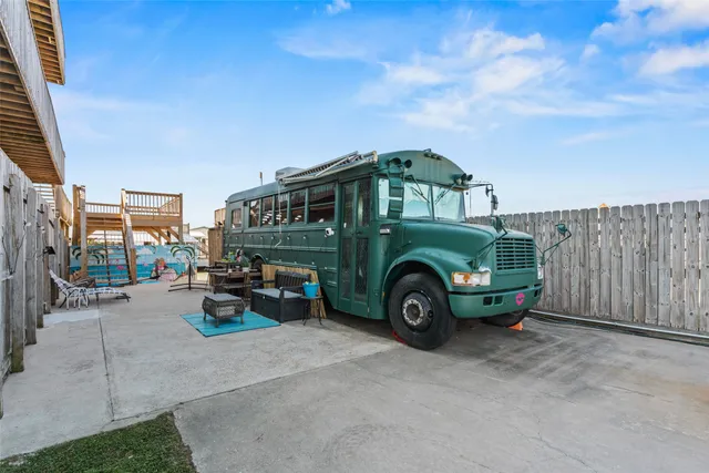 a front view of a house with parking space