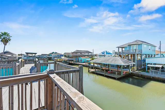 a view of deck with patio and wooden floor