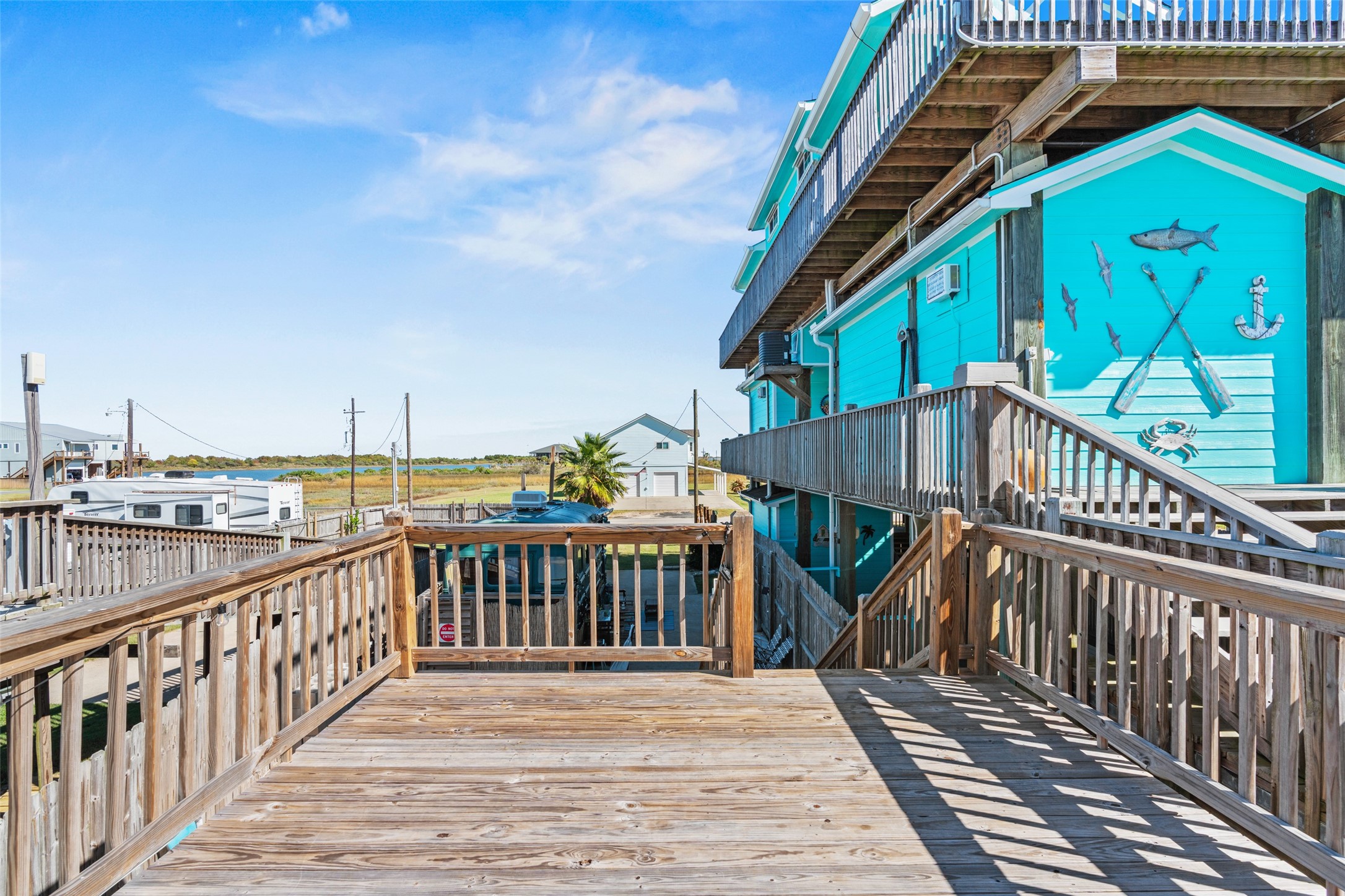 1287 North Crystal Beach Road Crystal Beach, TX 77650 - Photo 38 of 45 a view of deck with patio and wooden floor
