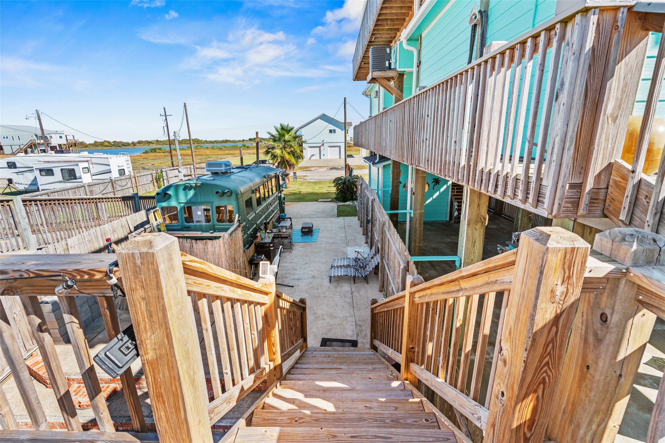 1287 North Crystal Beach Road Crystal Beach, TX 77650 - Photo 39 of 45 a view of balcony with wooden floor and fence