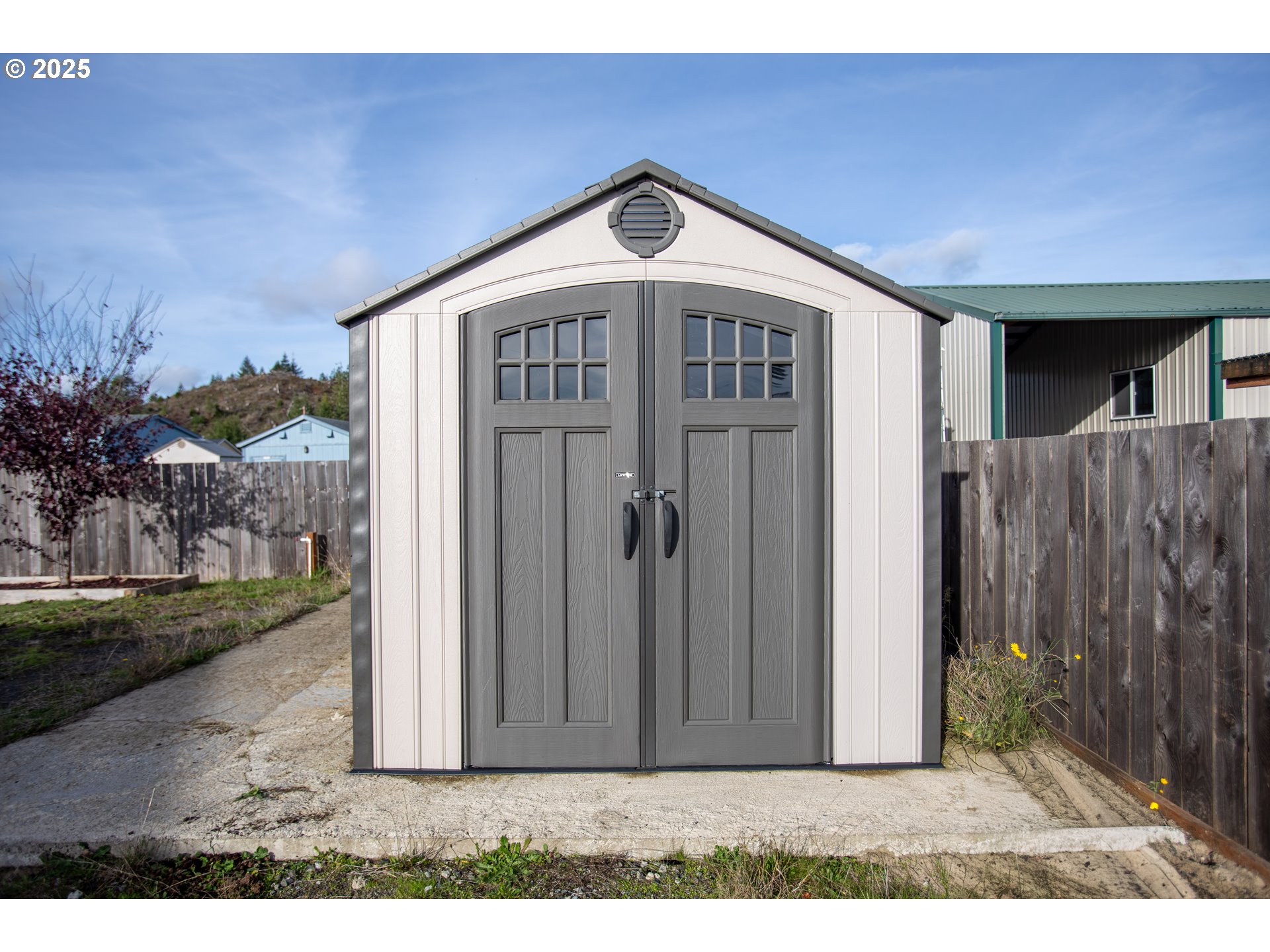 1010 Raechel Road Lakeside, OR 97449 - Photo 12 of 44 a front view of a house with a yard