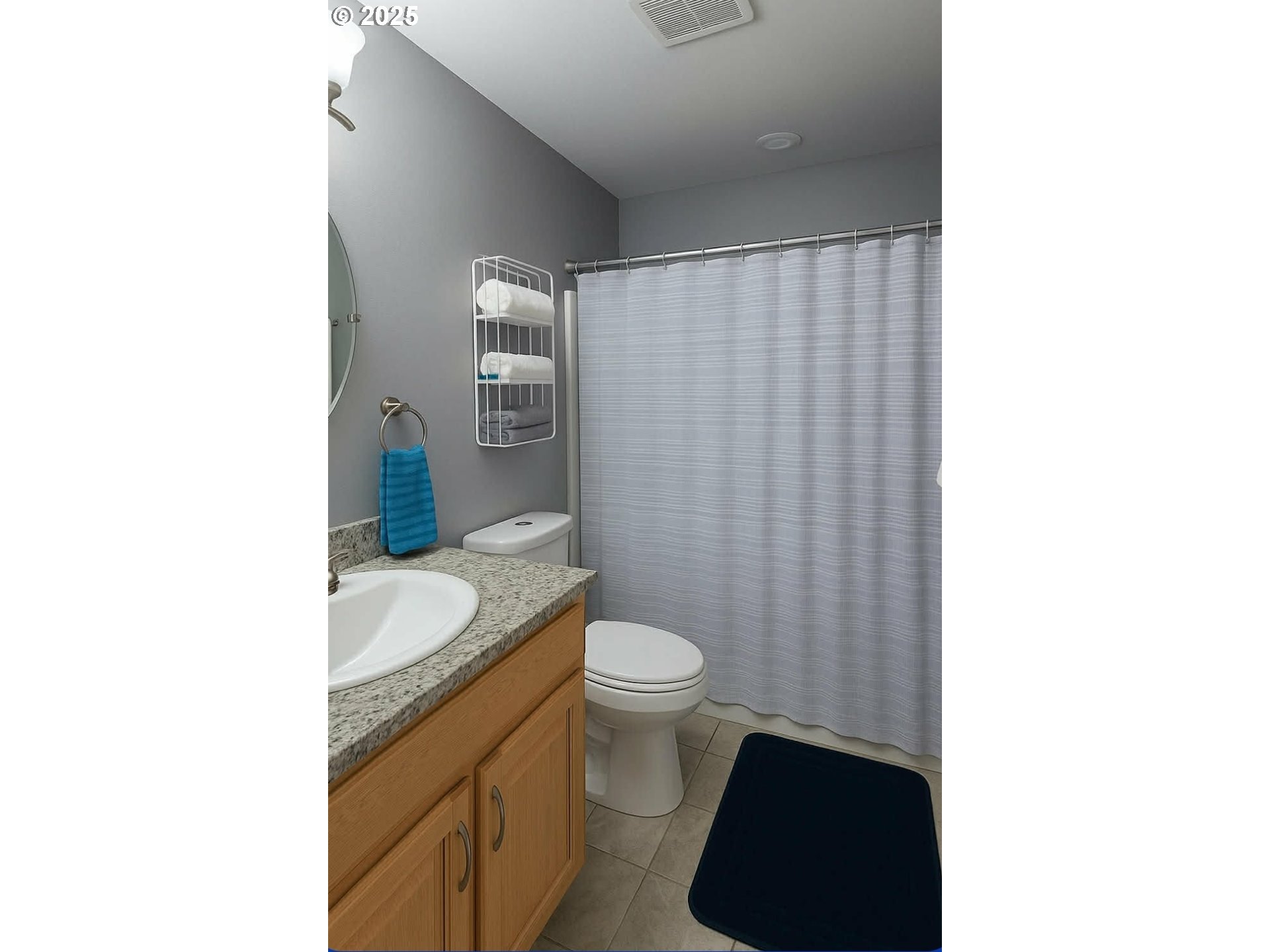 1010 Raechel Road Lakeside, OR 97449 - Photo 26 of 44 a bathroom with a granite countertop toilet and a sink