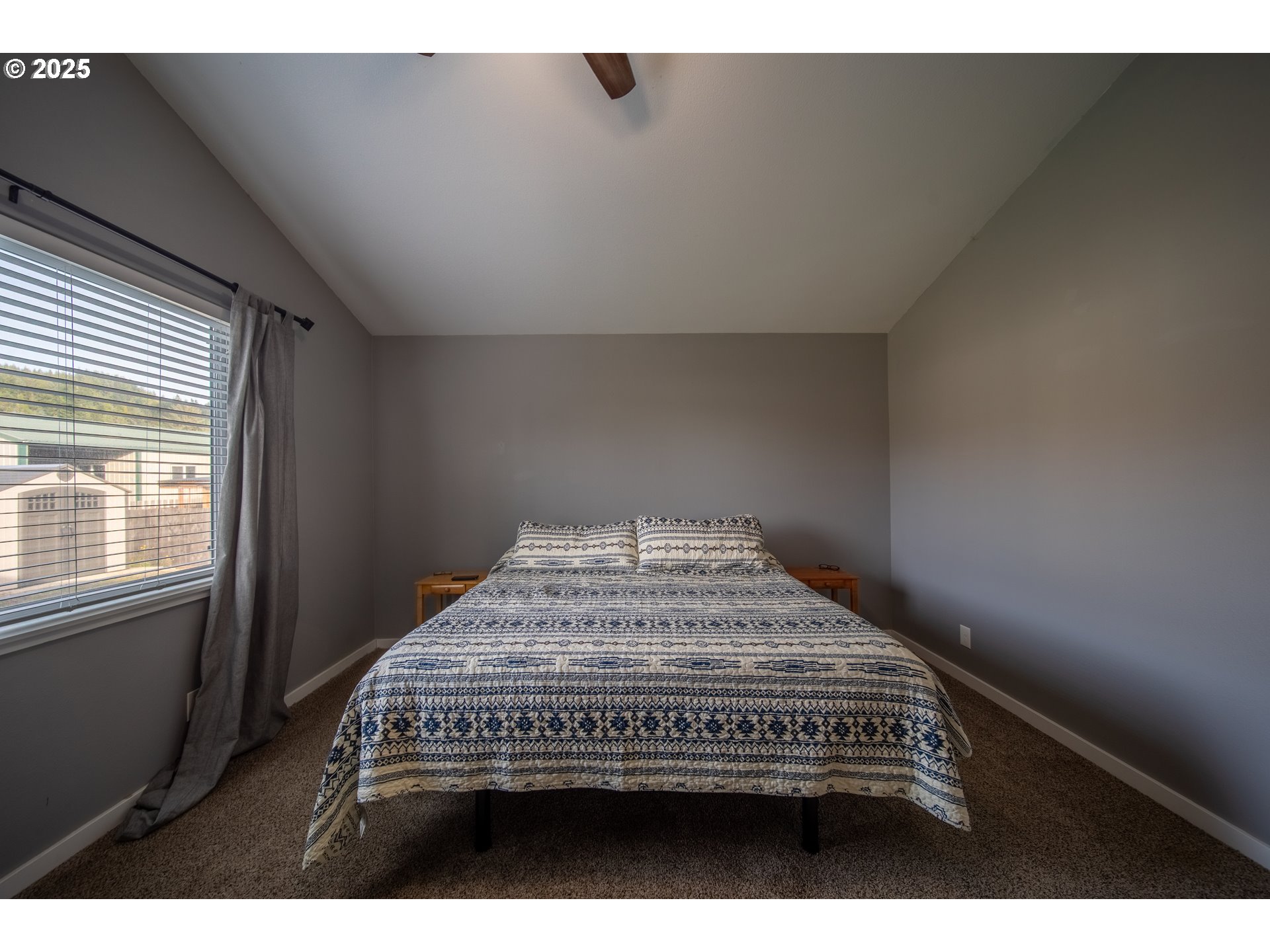 1010 Raechel Road Lakeside, OR 97449 - Photo 30 of 44 a view of a bedroom with a bed