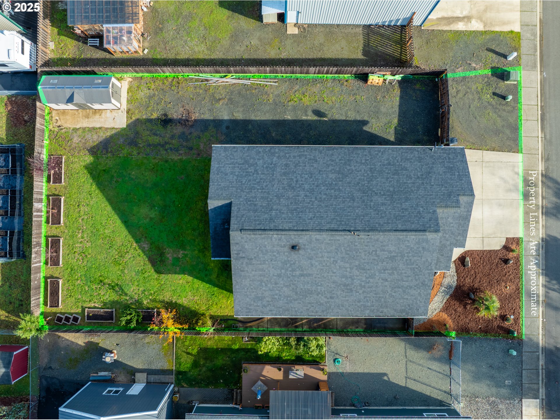 1010 Raechel Road Lakeside, OR 97449 - Photo 4 of 44 an aerial view of a house with a yard