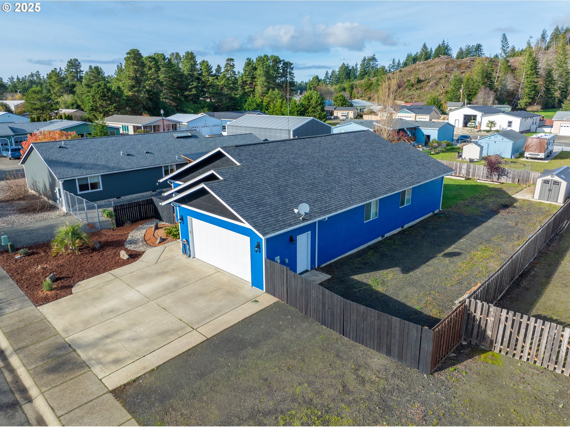 1010 Raechel Road Lakeside, OR 97449 - Photo 5 of 44 an aerial view of a house having yard