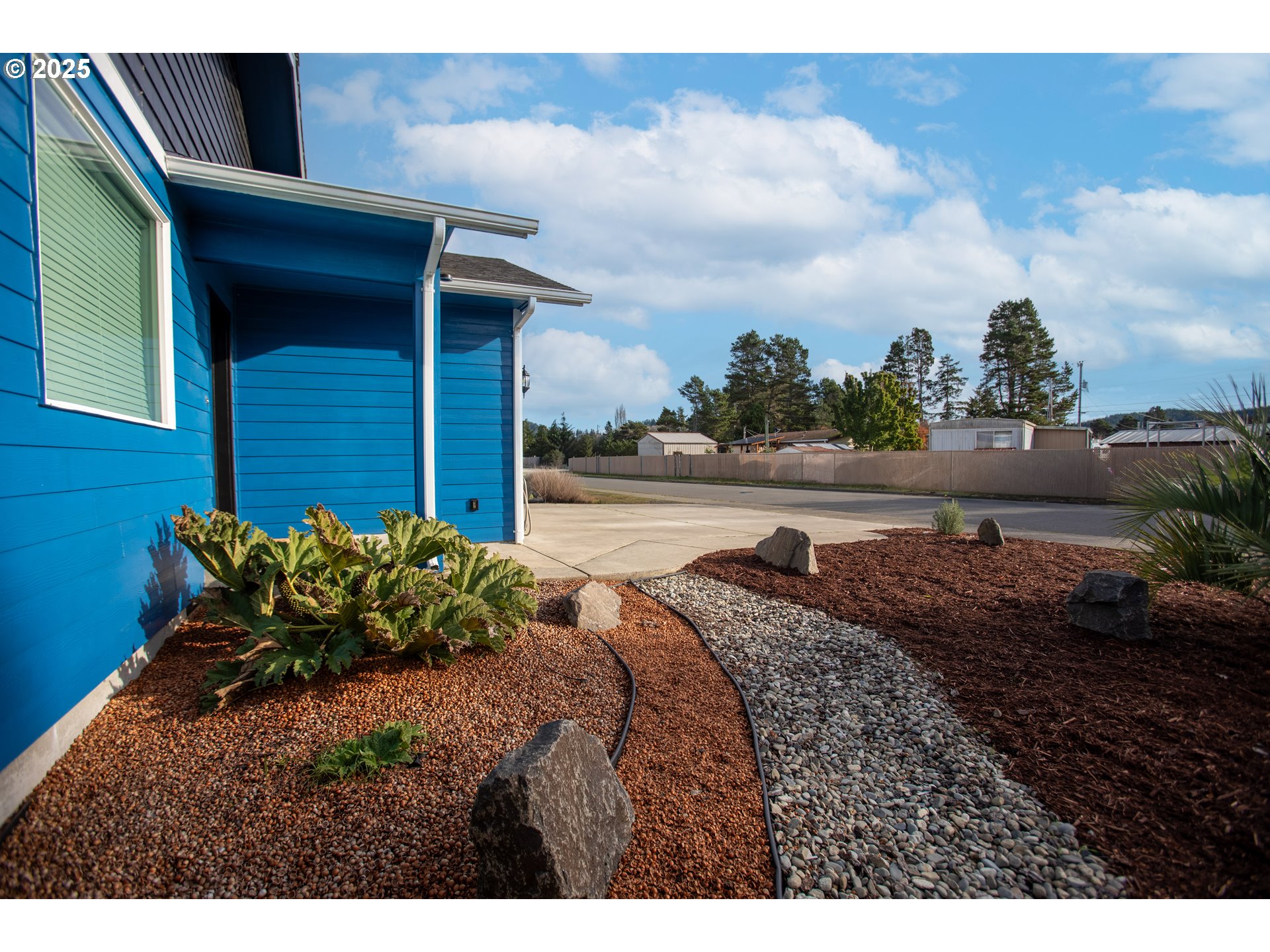 1010 Raechel Road Lakeside, OR 97449 - Photo 8 of 44 a view of a backyard of the house