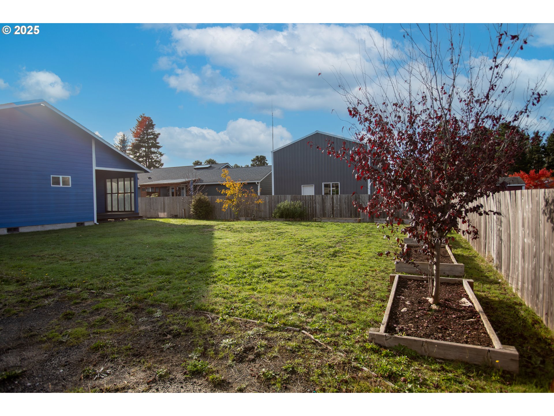 1010 Raechel Road Lakeside, OR 97449 - Photo 9 of 44 a view of a house with a yard