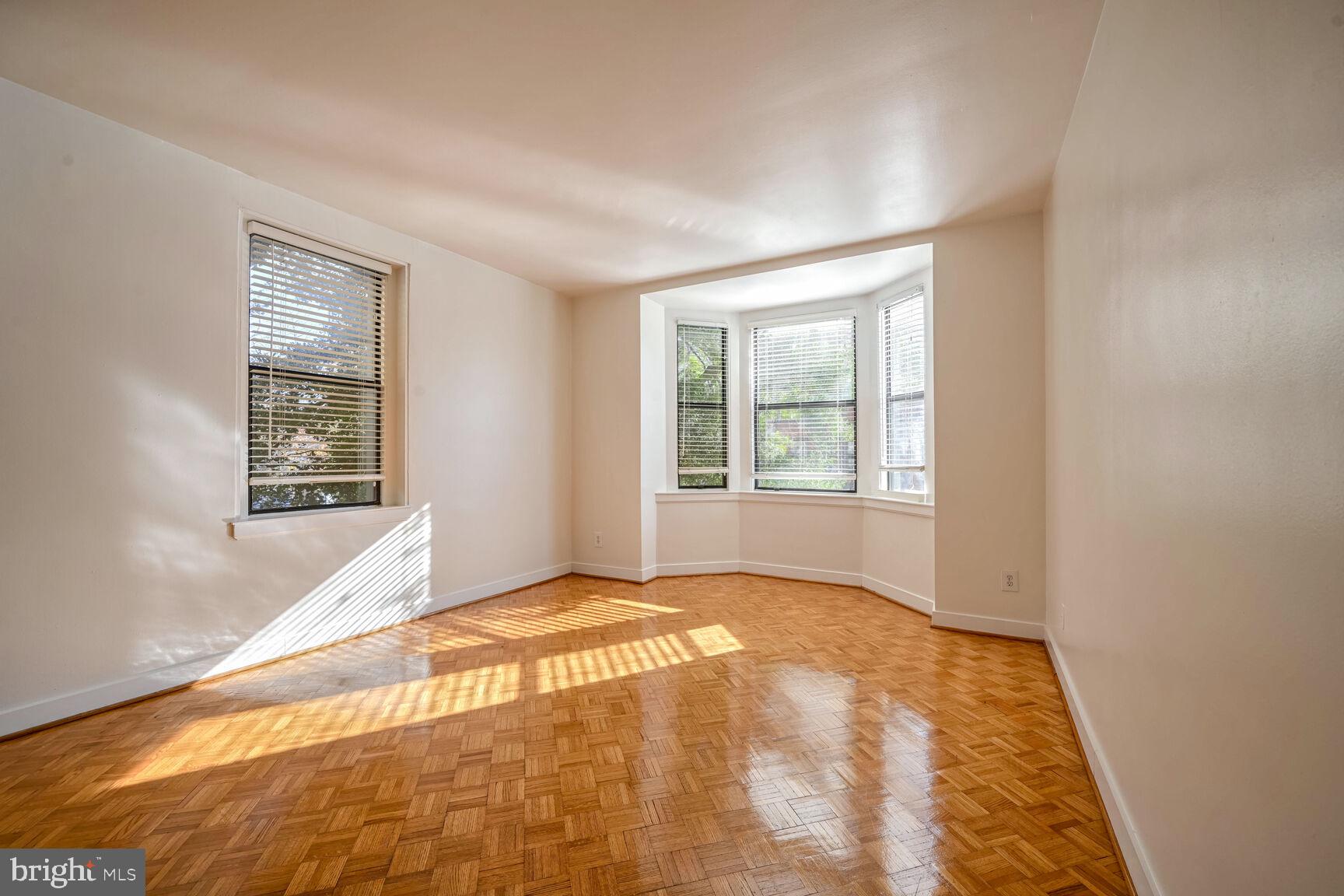 1669 Columbia Road Northwest, Unit 202 Washington, DC 20009 - Photo 2 of 13 Light-filled main space.