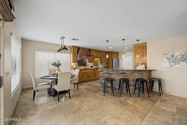 a view of a dining room with furniture