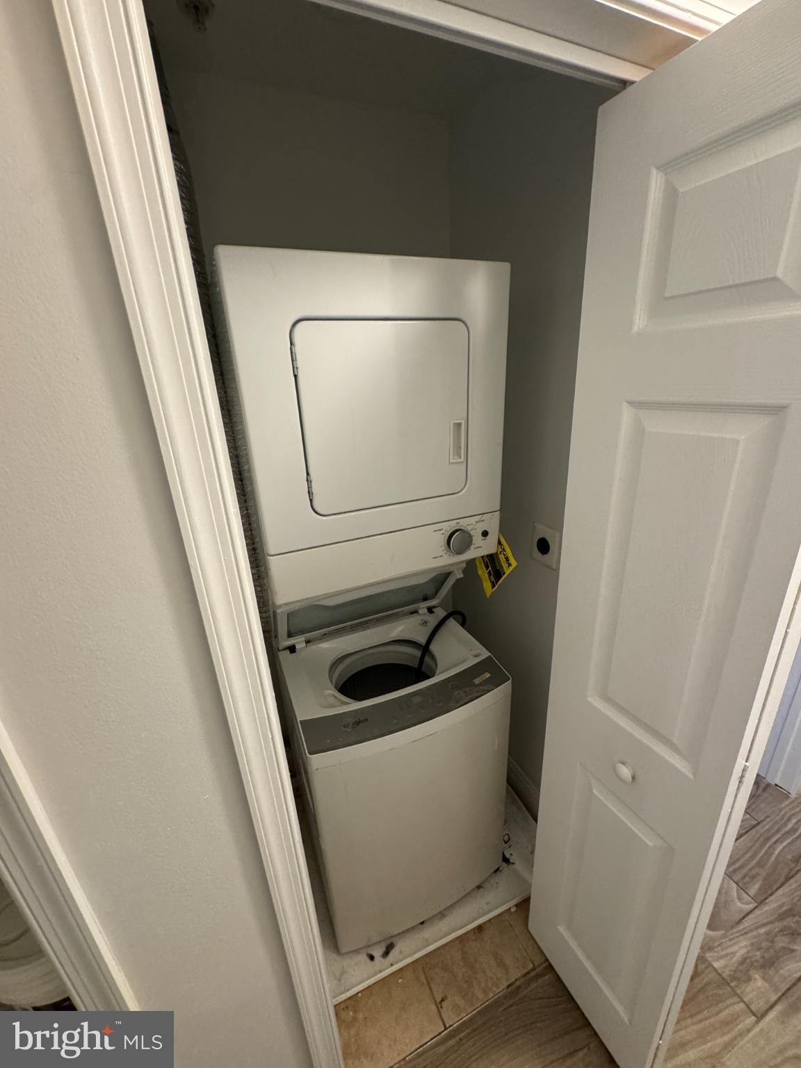4110 Ames Street Northeast, Unit 14 Washington, DC 20019 - Photo 4 of 7 a bathroom with a sink and washing machine