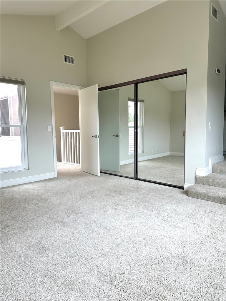 23 Whistling Swan Irvine, CA 92604 - Photo 13 of 26 an empty room with windows and closet