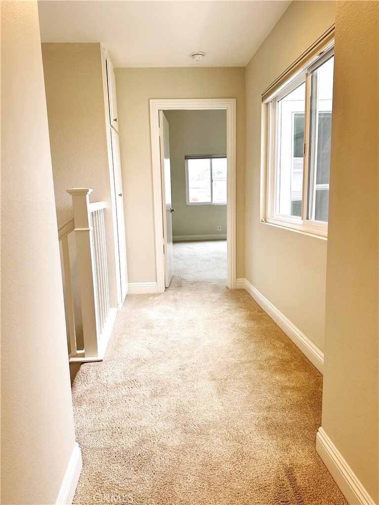 23 Whistling Swan Irvine, CA 92604 - Photo 14 of 26 an empty room with windows