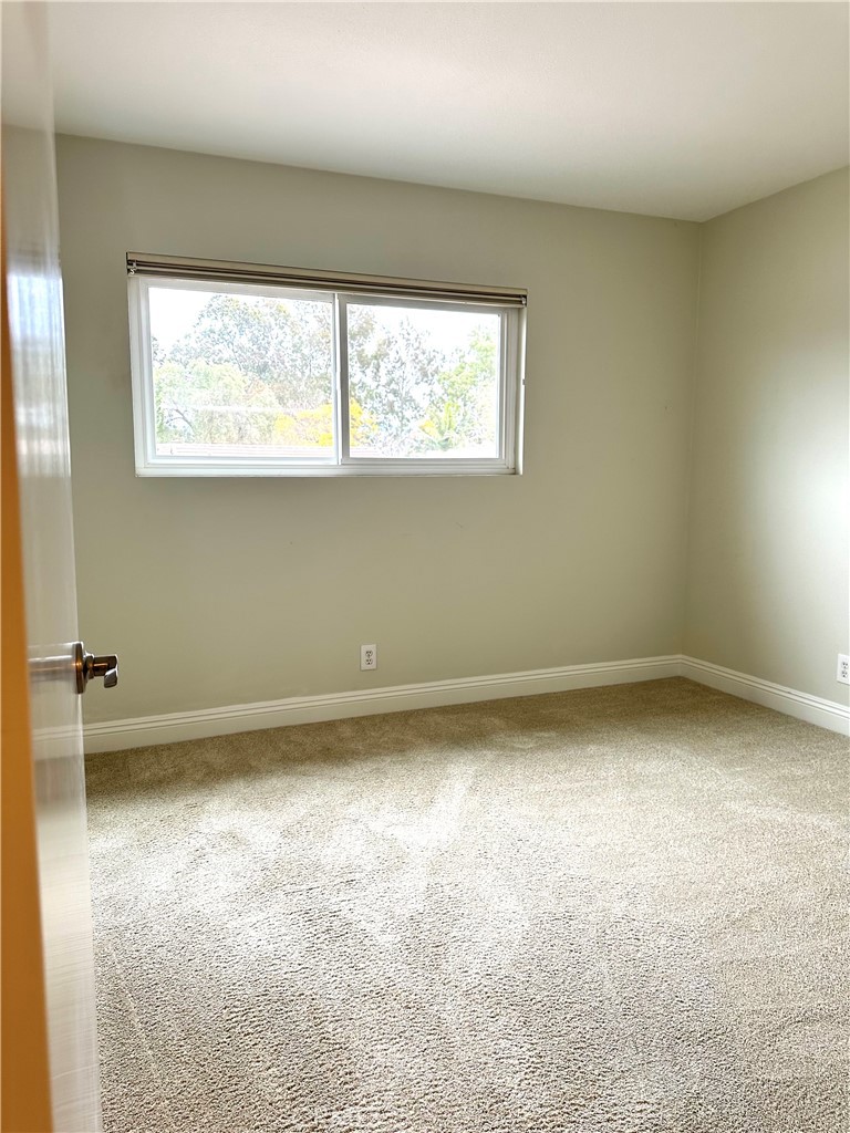 23 Whistling Swan Irvine, CA 92604 - Photo 15 of 26 an empty room with a window