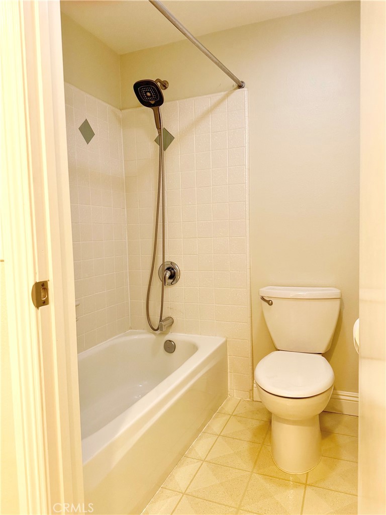 23 Whistling Swan Irvine, CA 92604 - Photo 16 of 26 a bathroom with a toilet and a shower