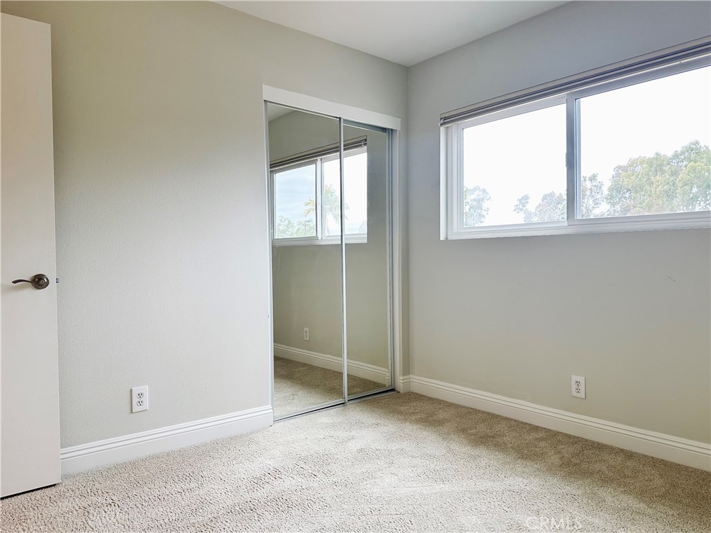 23 Whistling Swan Irvine, CA 92604 - Photo 19 of 26 an empty room with windows