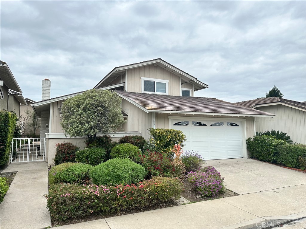 23 Whistling Swan Irvine, CA 92604 - Photo 2 of 26 a house view with a outdoor space