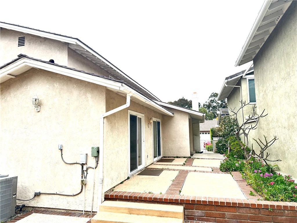23 Whistling Swan Irvine, CA 92604 - Photo 23 of 26 a view of a house with a patio
