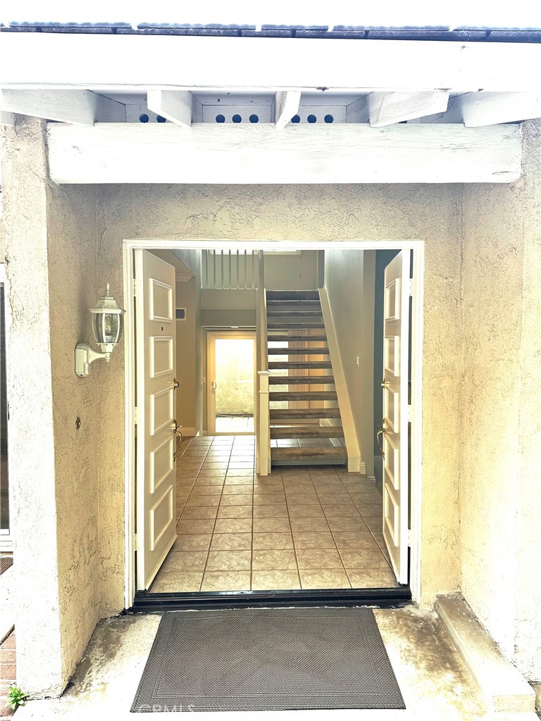 23 Whistling Swan Irvine, CA 92604 - Photo 24 of 26 a view of entryway with a rug