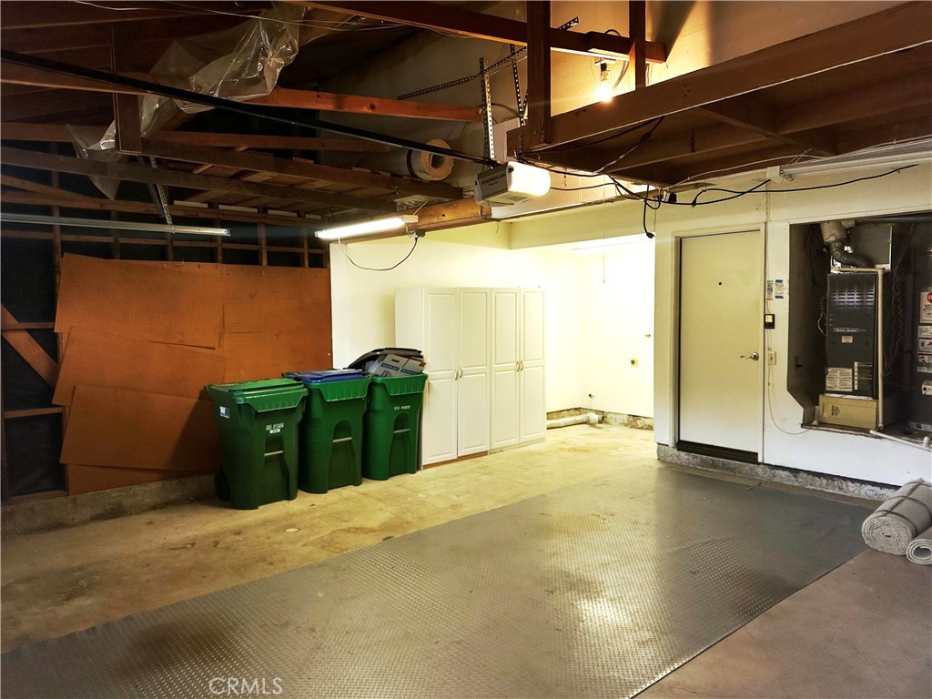 23 Whistling Swan Irvine, CA 92604 - Photo 25 of 26 a view of a car garage