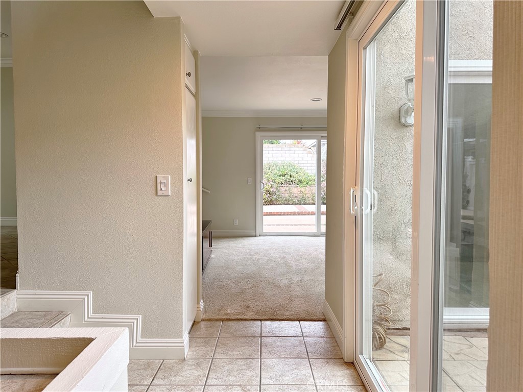 23 Whistling Swan Irvine, CA 92604 - Photo 5 of 26 a view of bathroom with a tub shower and a sink