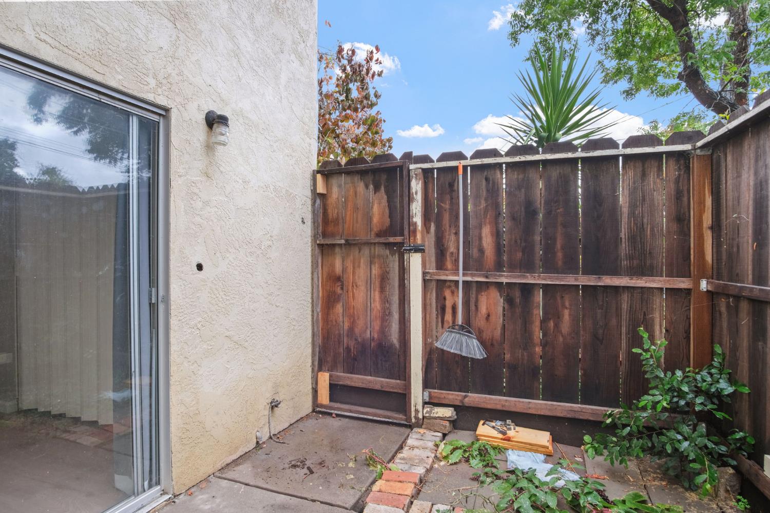 348 Wayside Drive Turlock, CA 95380 - Photo 20 of 22 a view of a backyard with a fence