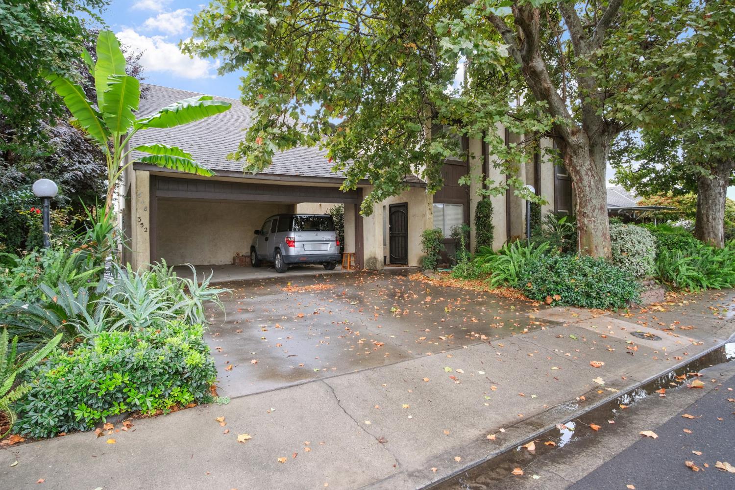 348 Wayside Drive Turlock, CA 95380 - Photo 3 of 22 a view of a house with a yard