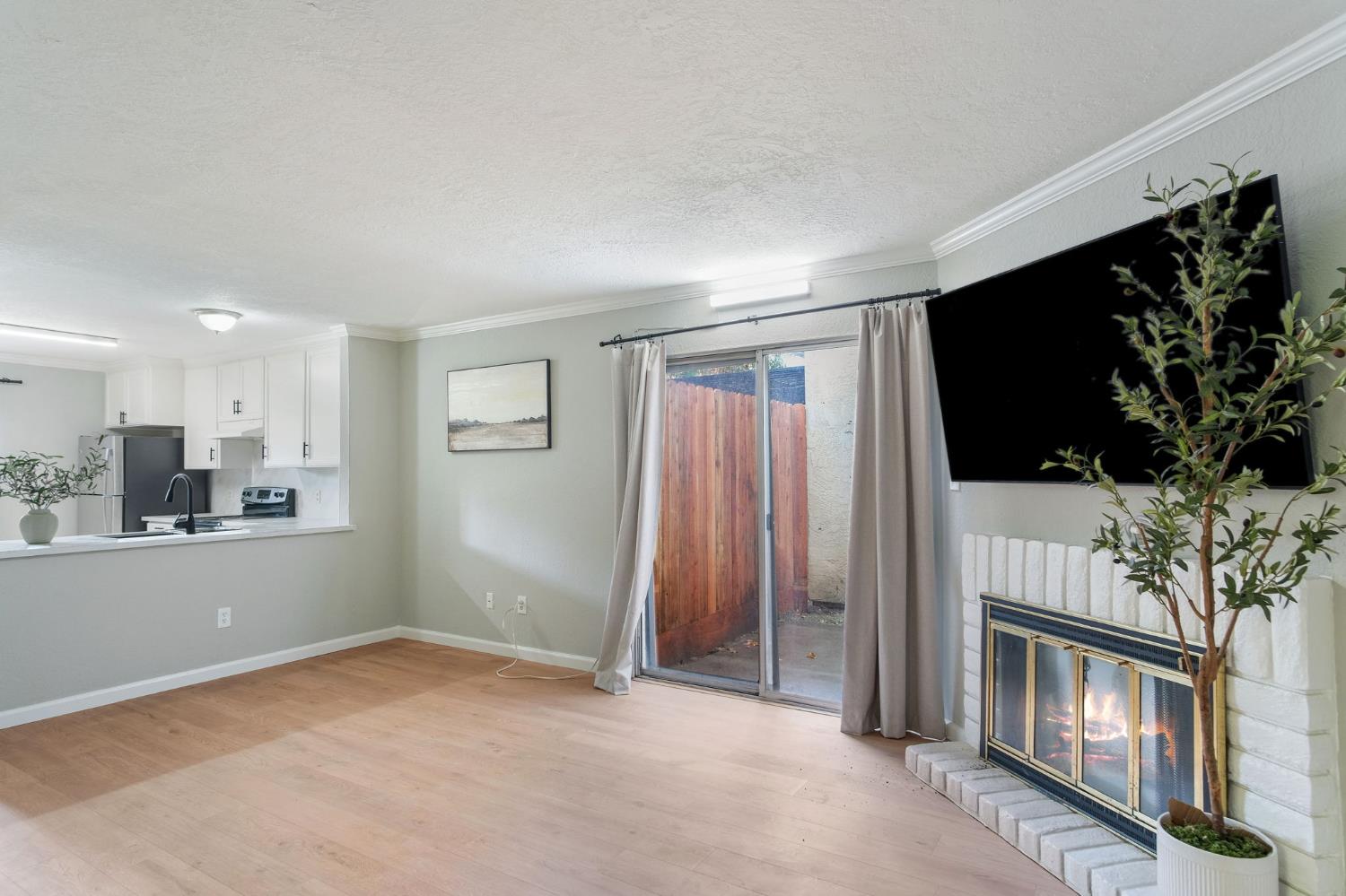 348 Wayside Drive Turlock, CA 95380 - Photo 6 of 22 a view of livingroom with furniture and flat screen tv