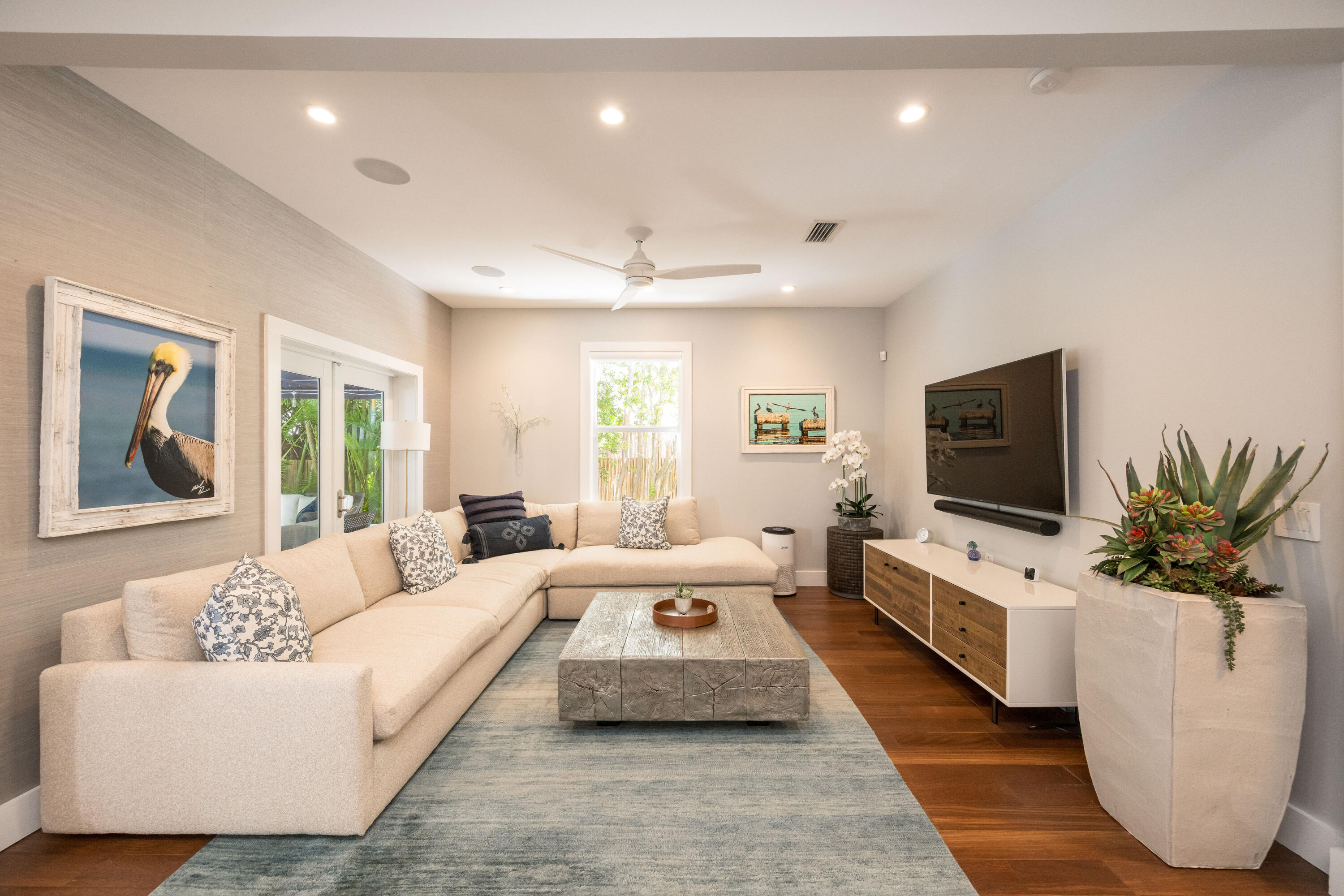 1231 Washington Street Key West, FL 33040 - Photo 23 of 41 a living room with furniture and a flat screen tv
