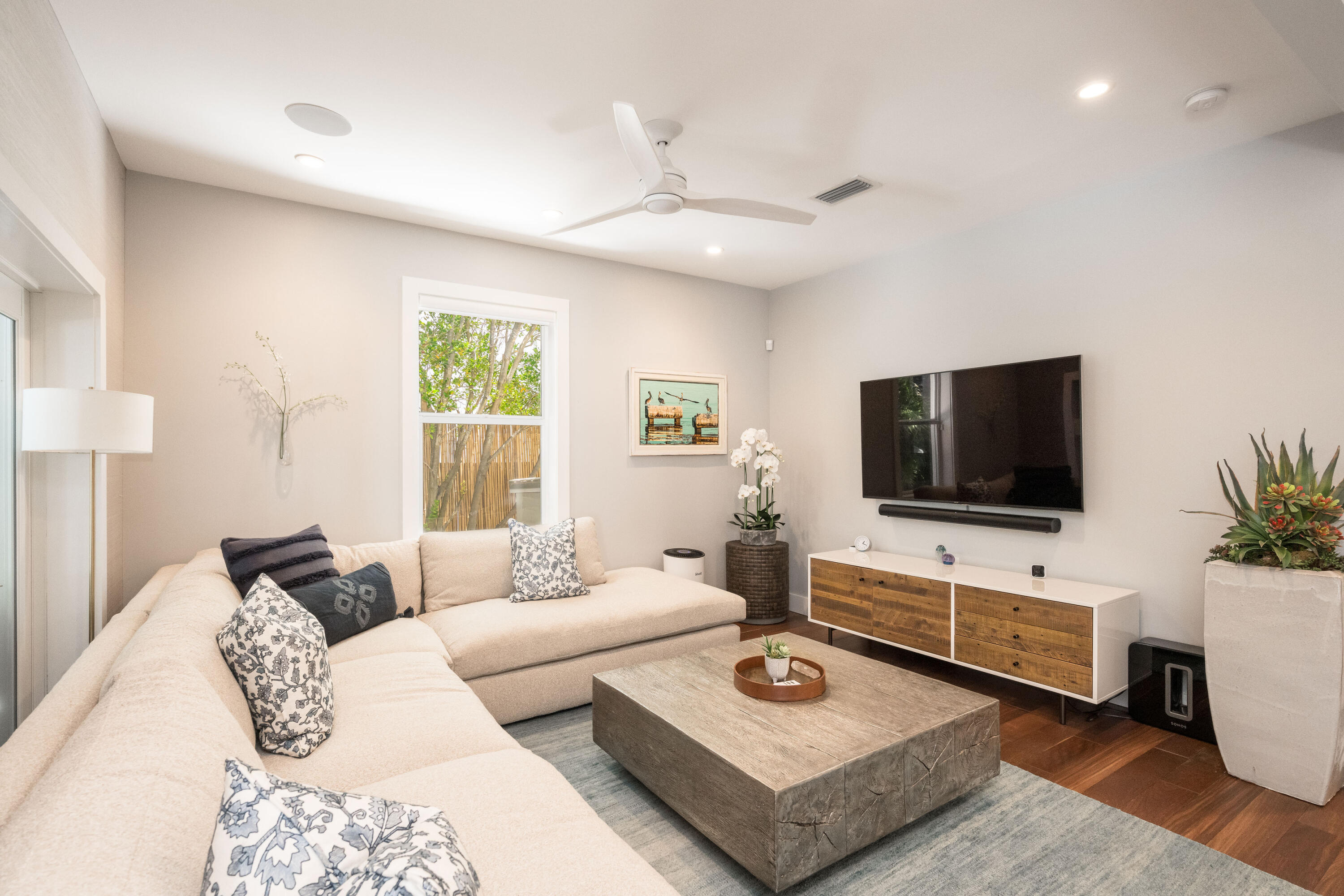 1231 Washington Street Key West, FL 33040 - Photo 24 of 41 a living room with furniture and a flat screen tv