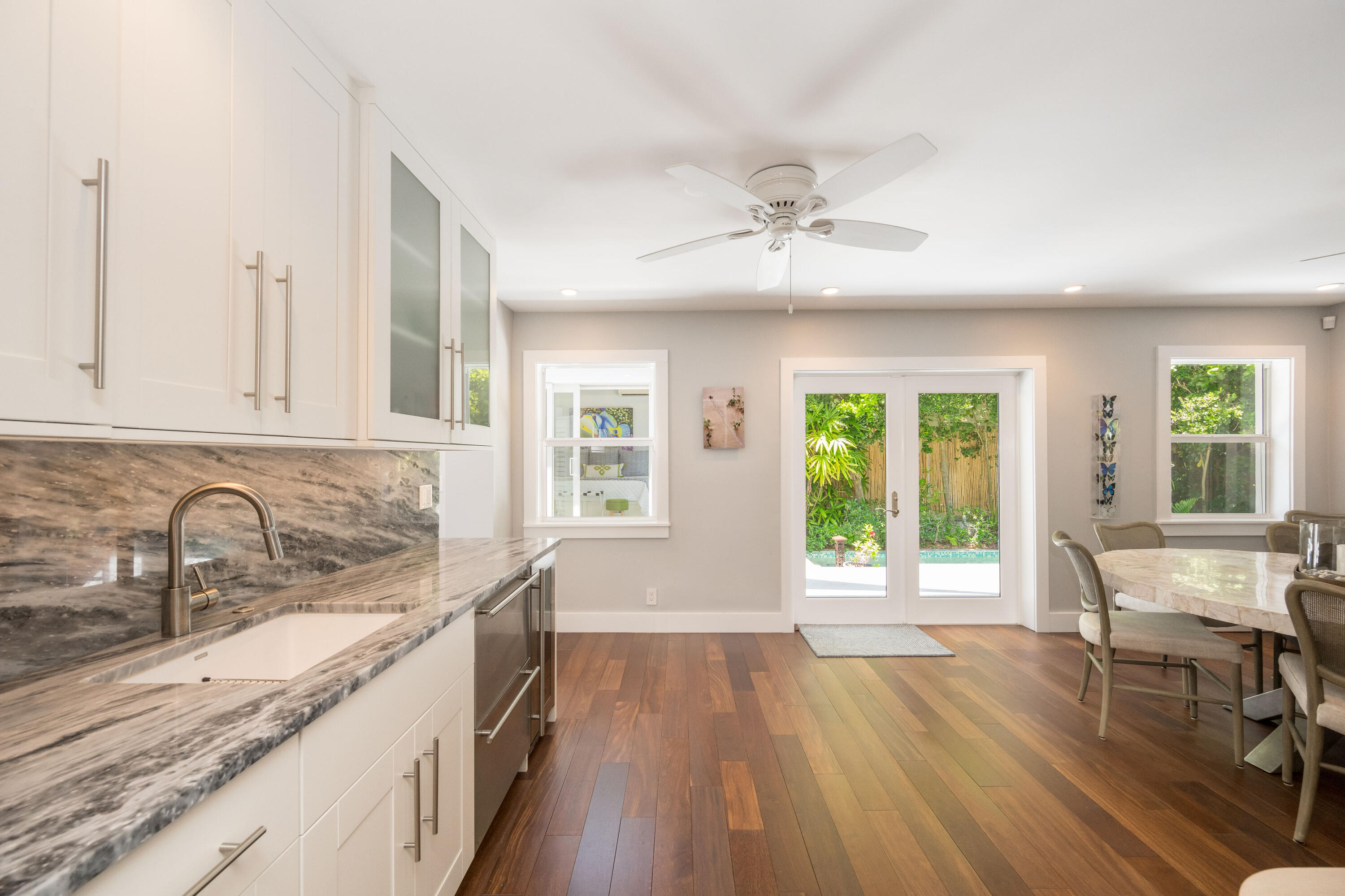 1231 Washington Street Key West, FL 33040 - Photo 28 of 41 a view of a kitchen counter space wooden floor and a sink