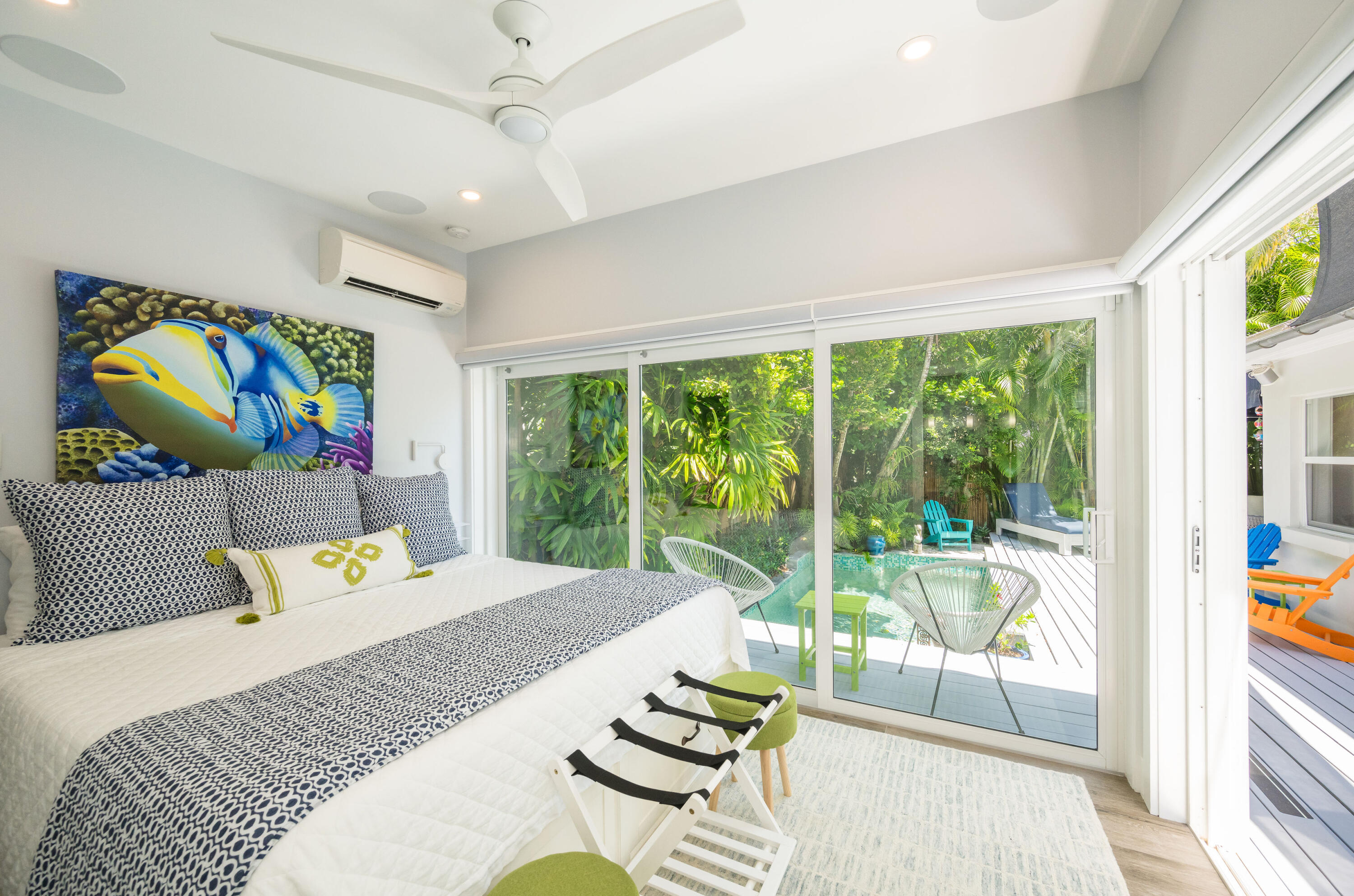 1231 Washington Street Key West, FL 33040 - Photo 35 of 41 a bed room with furniture and a large window