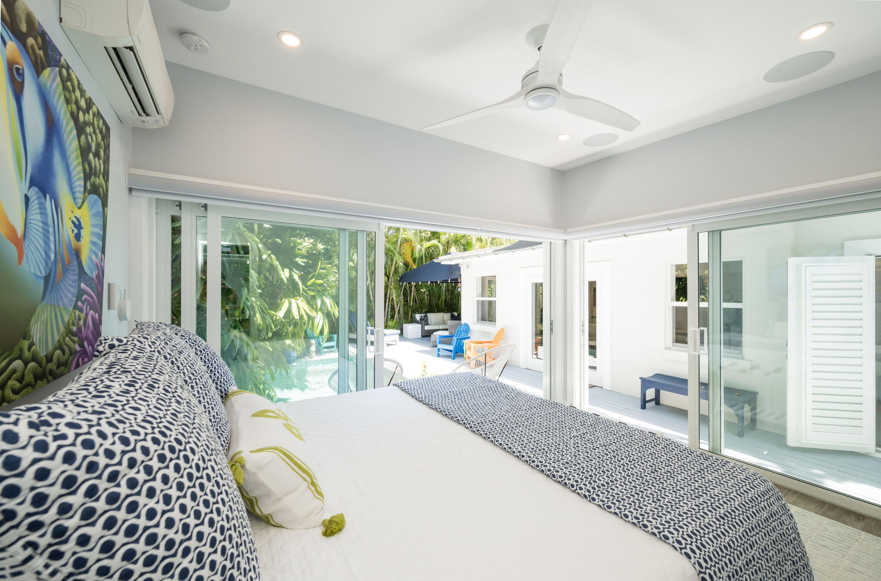 1231 Washington Street Key West, FL 33040 - Photo 38 of 41 a bedroom with a bed and a large window