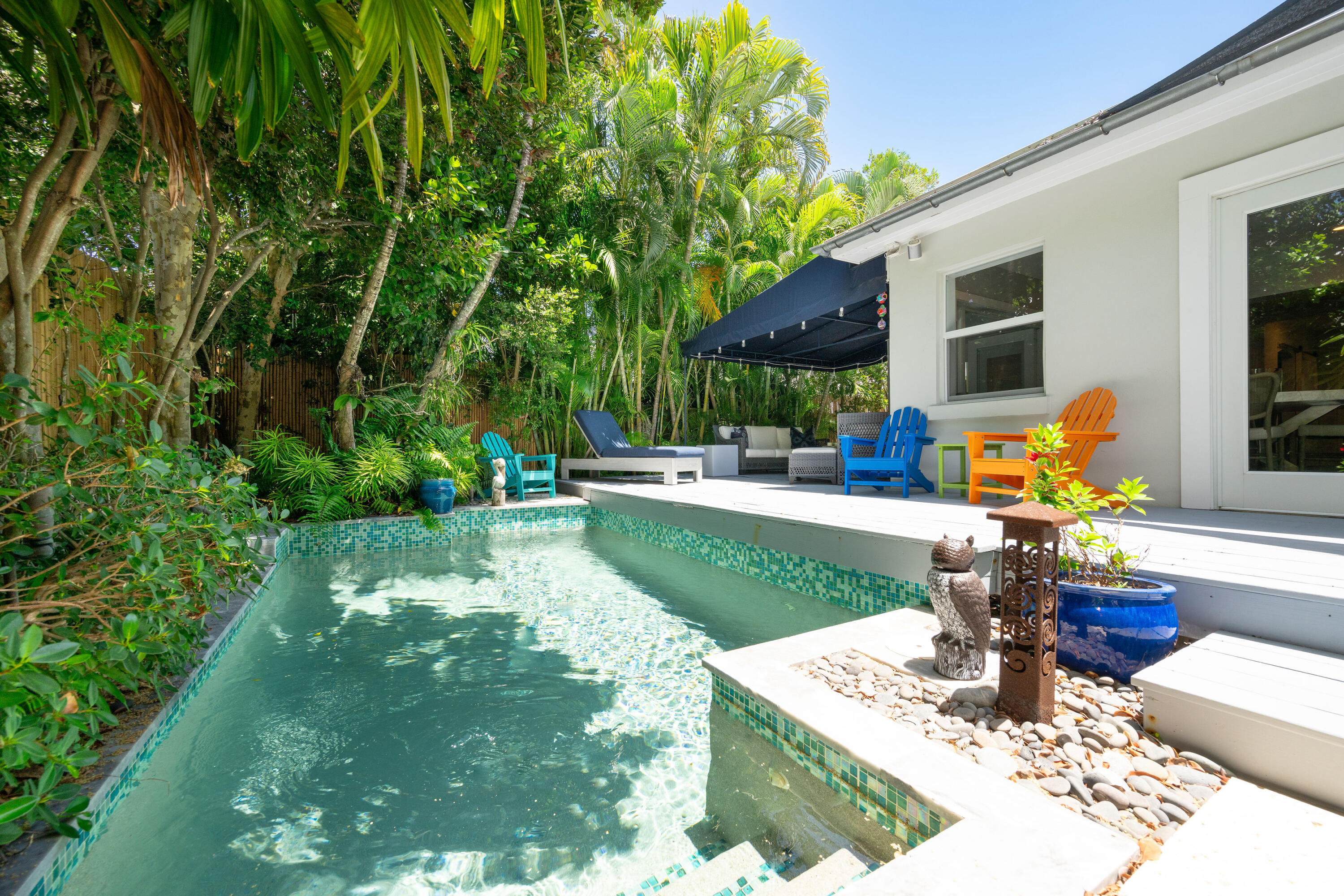 1231 Washington Street Key West, FL 33040 - Photo 39 of 41 a view of a house with backyard sitting area and garden