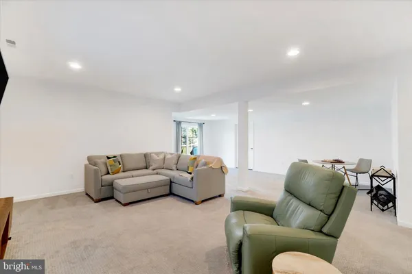 a living room with furniture and a couch